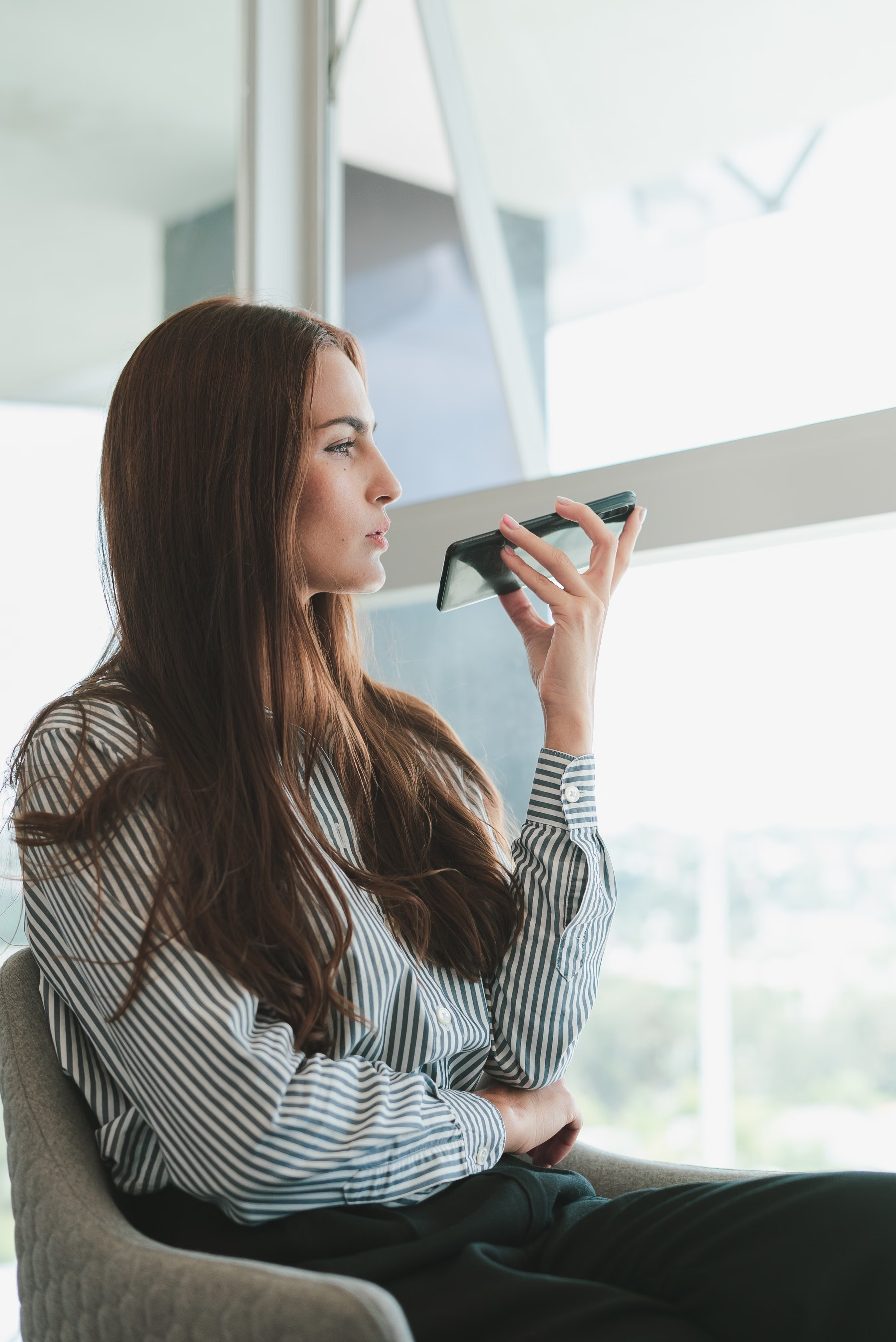 Woman using Menzo AI voice ordering